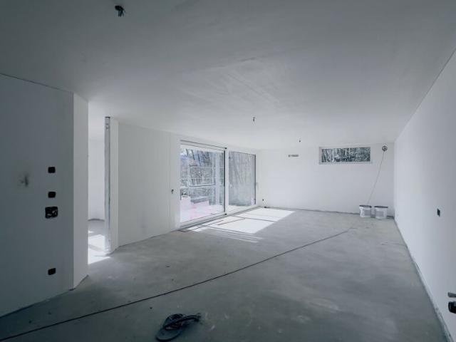 ESCLUSIVO 4.5 LOCALI CON GIARDINO E RUSCELLO IN CAPRIASCA