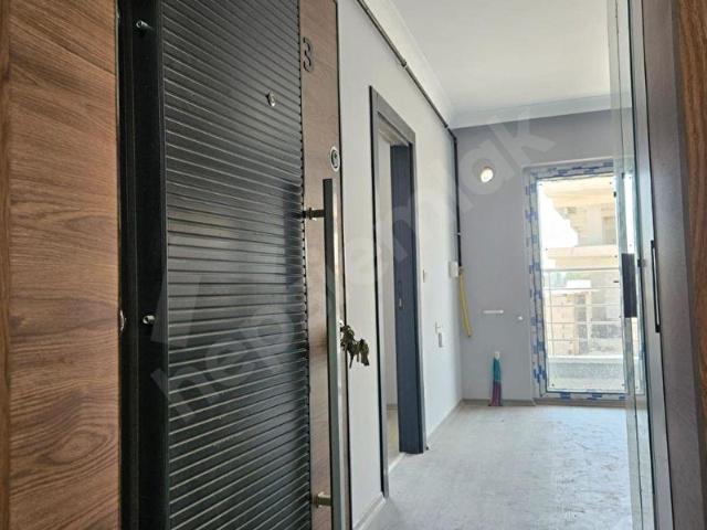 ESENBOĞADA YÜKSEK GİRİŞ SIFIR 1+1 GÜNEY CEPHE DAİRE