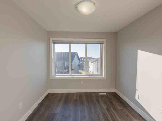 Essential Aurora Townhomes 1 Bedroom Home for Rent at 1332 Watt Dr Sw, Edmonton, AB T6X 2N3 Walker