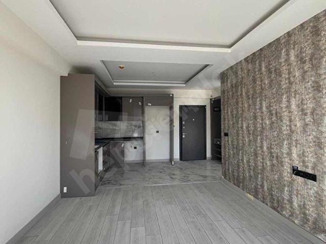 ERDEMLİ TÖMÜK'TE SATILIK SIFIR 1+1 LÜX DAİRE