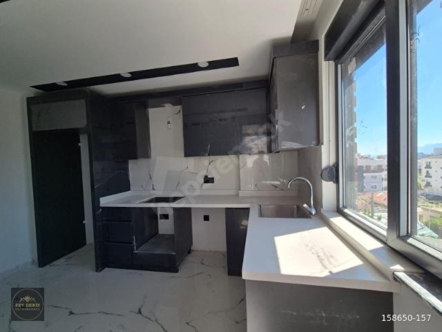 ERENKÖY'DE İ DOĞANER OKULUNA 150m 2.KAT SIFIR 2+1 DAİRE