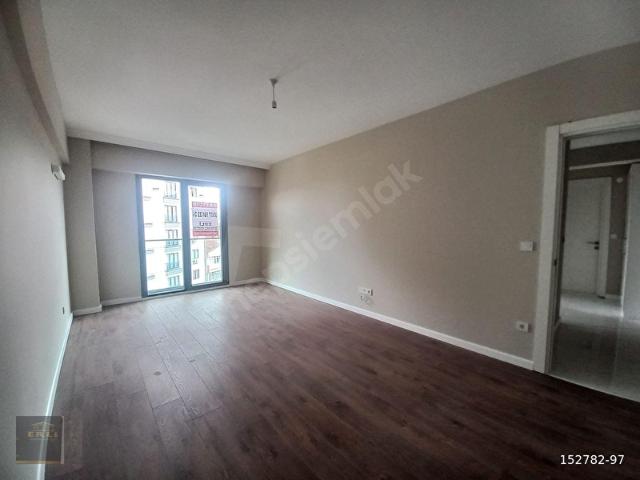 ERLİ'DEN AYDINLI BAHÇELERDE SIFIR BİNADA SATILIK 2+1 DAİRE