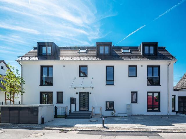 Erstbezug! Gartenwohnung mit Südterrasse, EBK,TG, Energieeffizienz!