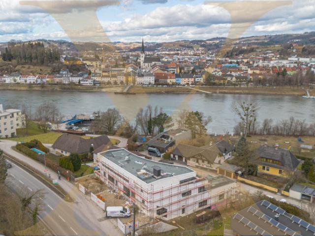 Erstbezug! Traumhafte 4 Zimmer Wohnung mit herrlichem Donaublick mit Eigengarten & Terrasse zu vermieten!