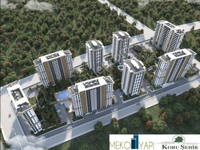 Ertaş'tan Koruşehir Sitesinde Deniz Manzaralı Satılık 3+1 Daire