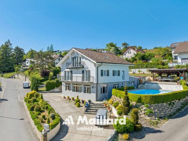 Ertragspotenzial – Haus mit 2 Wohnungen, einer Werkstatt und Parkplätzen