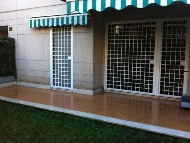 EUR TORRINO BILOCALE CON GIARDINO PRIVATO