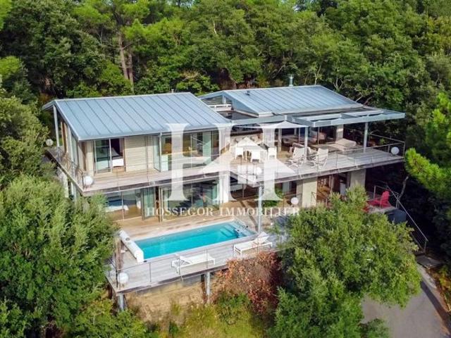 Évasion Luxueuse: Villa Panoramique entre Océan et Forêt des Landes