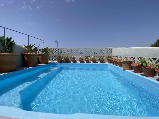 Excepcional Beachside Living con un retiro privado en la azotea