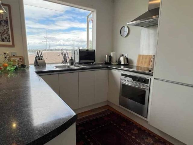 Exceptional Two Bedroom plus Study Townhouse with Stunning Lake Views