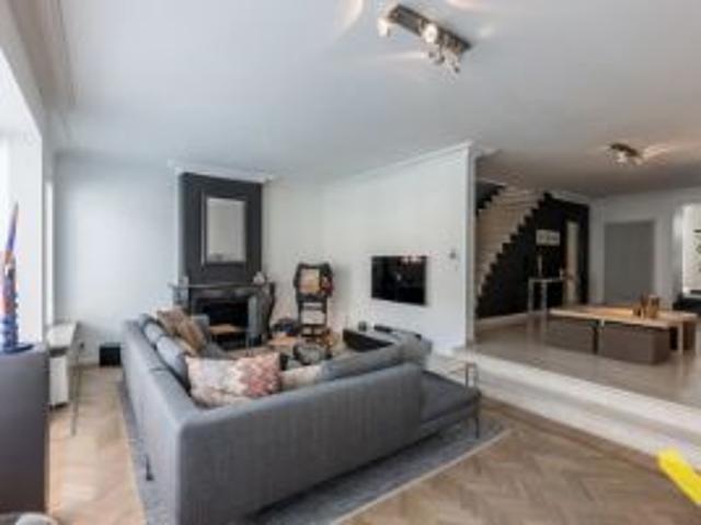 Exclusieve centraal gelegen woning met handelspand