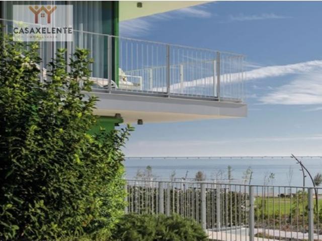 Exclusivo T2 no PRATA RIVERSIDE VILLAGE Braço de Prata com Terraço, Garagem e Áreas Generosas