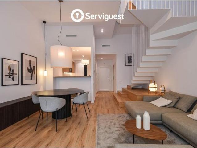 Exclusiva planta baja dúplex de obra nueva con terrazas privadas en el corazón de Gràcia