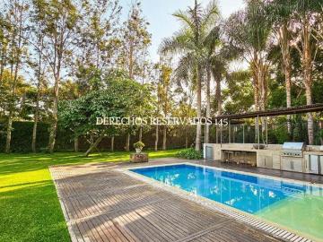 Exclusiva Residencia de 4,960m2 Colindante al Country Club La Planicie