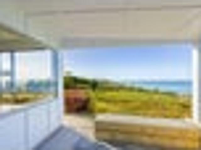 Exclusive coastal living with private beach access