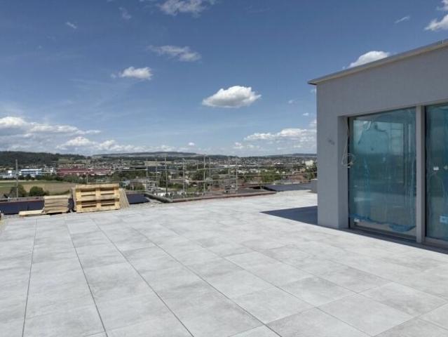 Exclusive attic studio apartment with 93 m² terrace and far reaching views
