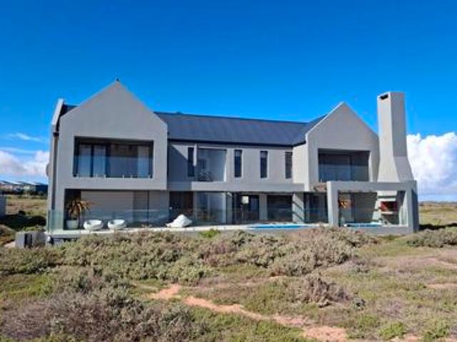 exclusive beachfront luxury in a pri.
