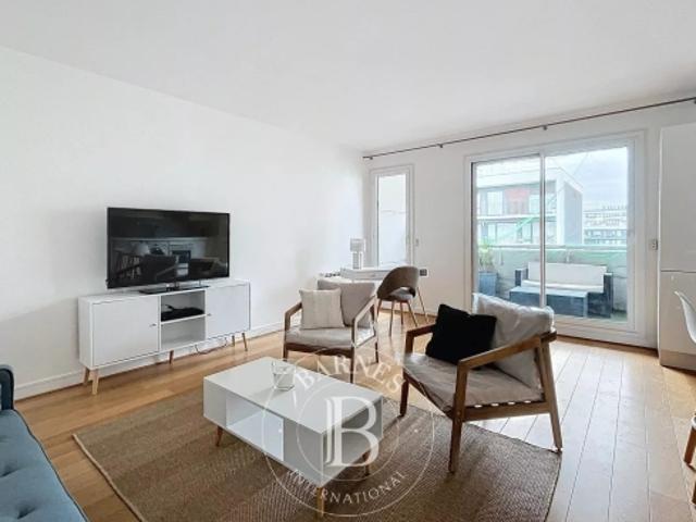 Exclusivité Barnes Silly / Les Passages Appartement de 53 m2 avec balcon / terrasse