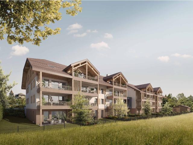 EXCLUSIVITE EVIAN T4 82 m², jardin avec terrasse, cellier, garage et stationnement 74500