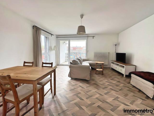 Appartement de type IV avec parkings et balcon