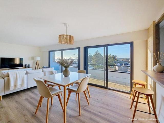 EXCLUSIVITÉ LOCMIQUÉLIC: Appartement avec vue au Port de Sainte Catherine