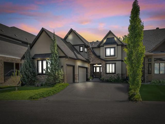 Executive 5 Bedroom Estate Home Backing onto Forest — Rocky Ridge NW