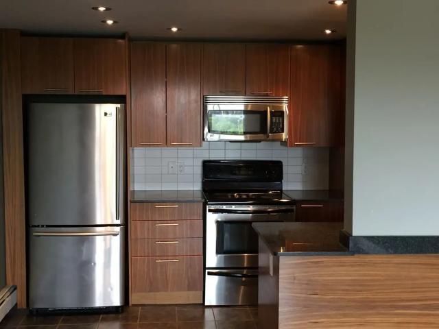 EXECUTIVE CONDO ACROSS FROM SAIT UTILITIES INCLUDED