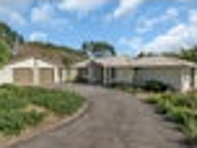 Beautifully Built Brick Home Plus Garaging & Sheds