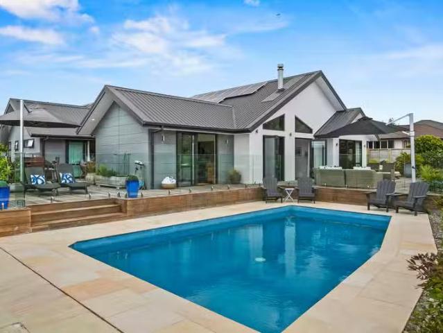 EXECUTIVE RESORT STYLE LIVING – First National Real Estate
