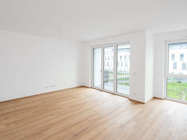 Exklusive 3 Zimmer Neubauwohnung mit Balkon und idyllischem Blick auf die begrünte Parkanlage