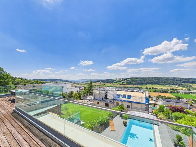 Exklusive 6.5 Zimmer Maisonette Terrassenwohnung mit Alpenpanorama & 75 m² Sonnenterrasse