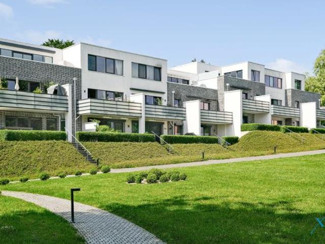 Exklusive Dachgeschosswohnung in parkähnlicher Wohnanlage mit Fördeblick