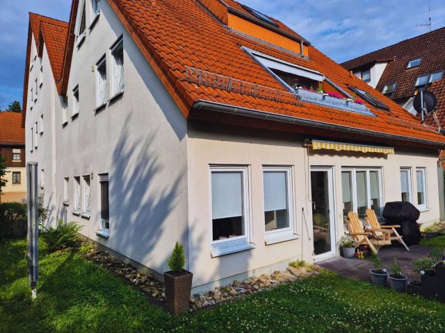 Exklusive Maisonette mit Haus im Haus Charakter in zentraler Lage