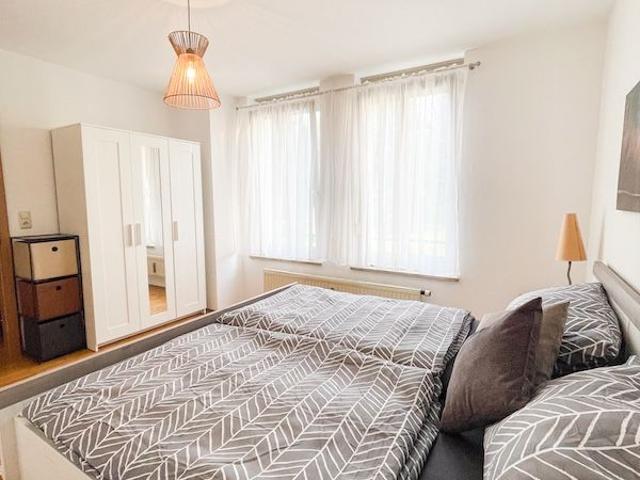 Exklusive, voll möblierte 2 Zimmer Wohnung mit großer Dachterrasse und Alpenblick