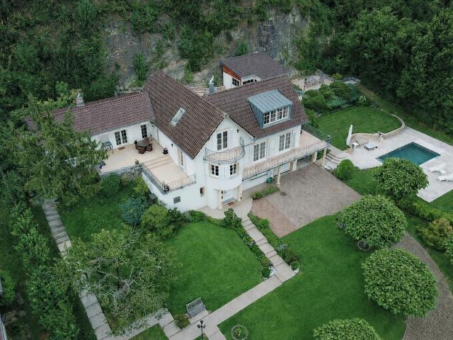 Exklusive Villa mit See und Alpensicht sowie Pooloase