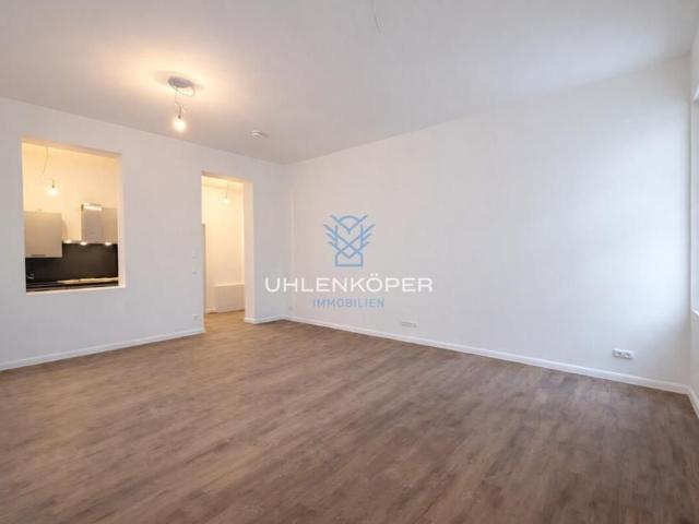 Exklusiver Erstbezug einer 3 Zimmer Wohnung im stilvoll sanierten Altbau