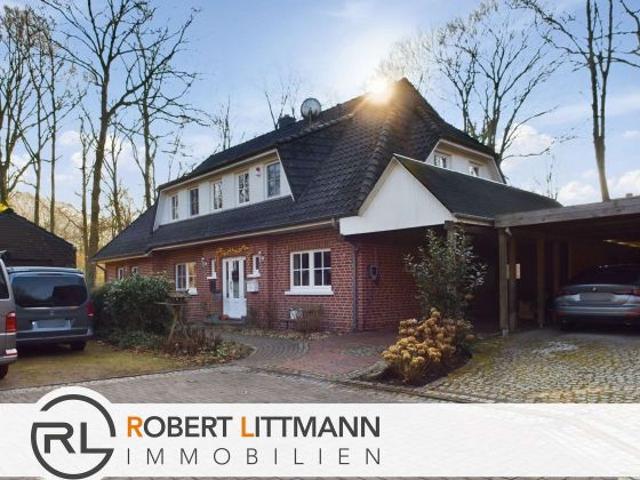 Exklusives Einfamilienhaus mit Einliegerwohnung und parkähnlichem Garten in Bremen Schönebeck