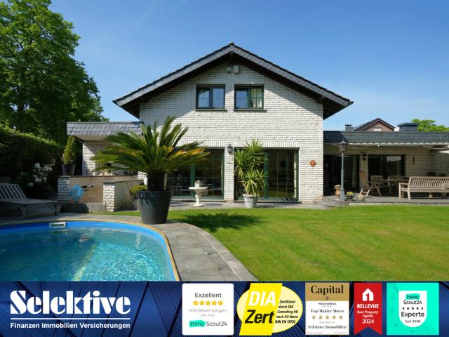 Exklusives Wohnensemble mit Südlage, Pool & Kamin – Stilvolles Einfamilienhaus in Toplage