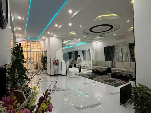 Experience Elite Living 1 Kanal Triple Storey Luxury Designer Smart Home | Fully Furnished | Imported Interior | Premium Finishes