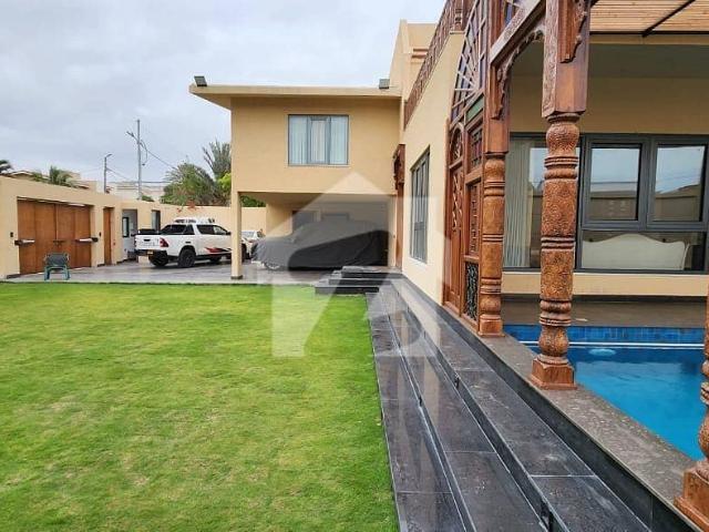 Experience Premium Living In This Stunning 1000 Square Yards Fully Furnished House With Pool & Basement Five Bedroom