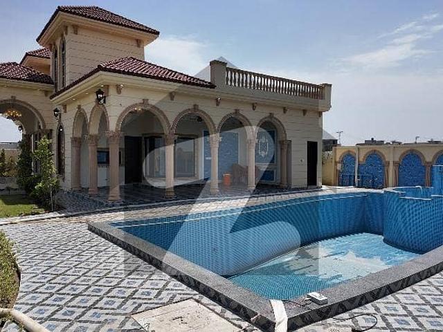 Exquisite 4 Kanal 12 Marla Fully Furnished Farmhouse with Pool & Lavish Lawn Demand 8 Crore