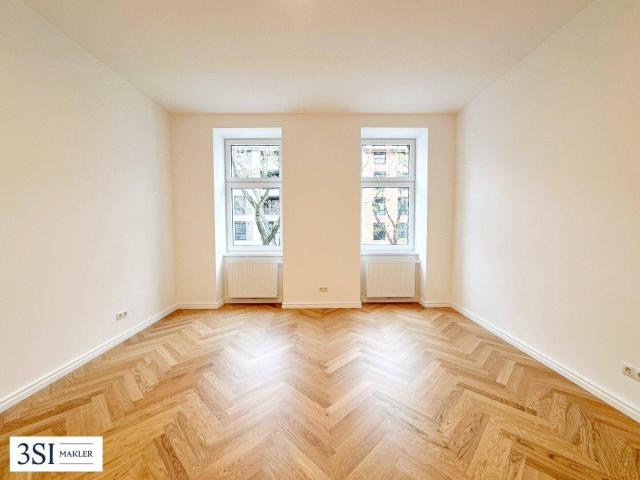 Exquisite Wohnqualität: Frisch sanierter Altbau mit Balkon