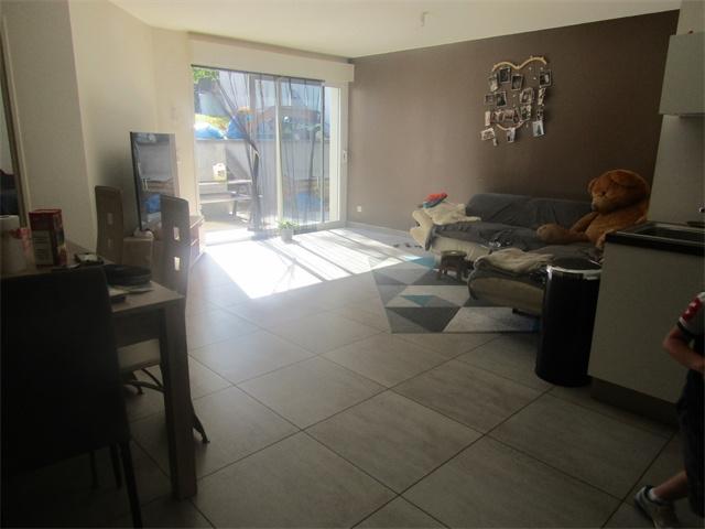 F3 en RDC avec cuisine équipée, grand garage, terrasse et grand jardin