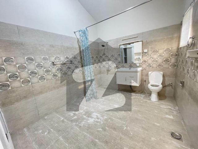 F10 666 sqy house specious washrooms and kitchen beautiful lawn ideal location close end street modren fitting and fixtures f 10
