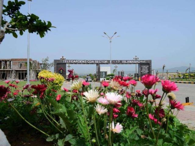 F17 CDA Sector One kanal plot Possotion All paid Islamabad F 17 ID 43601