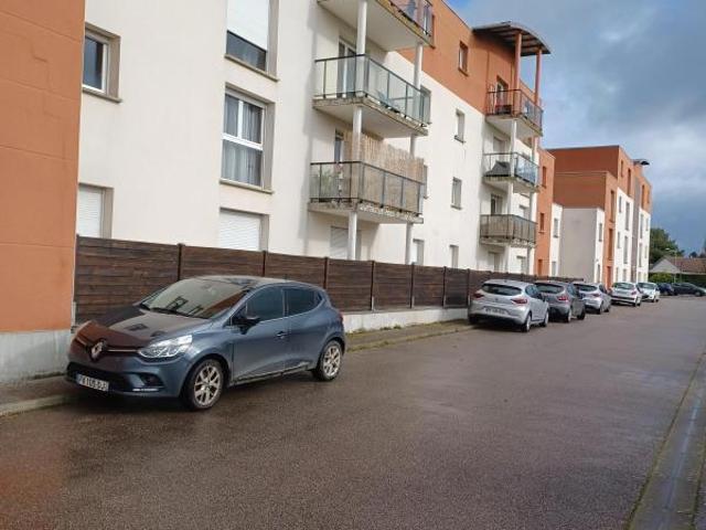 F2 AVEC UN E PLACE DE PARKING INTERIEUR