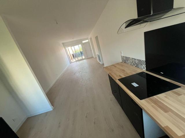 F4 90 m2 neuf / terrasse/ garage double / cave