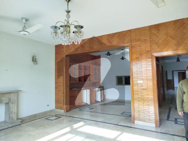 F 11 Excellent 1 Kanal Double Story House Proper And Modern Fittings, Tiled Flooring 5 Bedrooms with 5 Attached Bathrooms TV Lounge. 2 Drawing & Dining Rooms. 2 Kitchens F 11