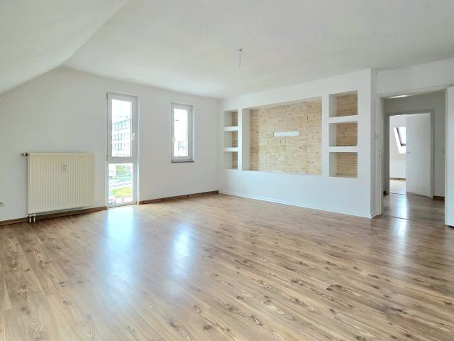 Familienfreundliche 4 Zimmer Wohnung – mit Tiefgarage, Spielplatz & Dachbodenausbaupotenzial