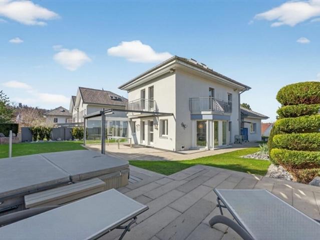 Familienfreundliches Einfamilienhaus mit vielseitigen Nutzungsmöglichkeiten und privater Gartenoase